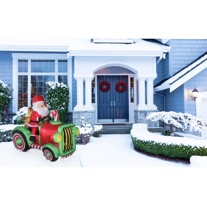 Celebrations Santa With Tractor 6 ft. Inflatable