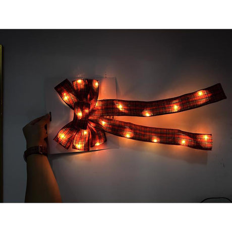 Lin-Con Marketing Omega Bright Designs 10 in. D X 1.5 ft. L LED Prelit Warm White Plaid Bow Garland